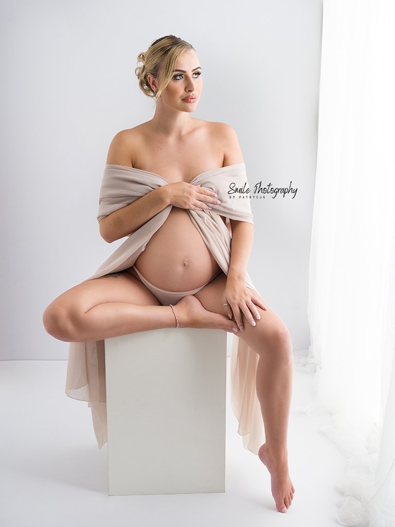 Beautiful maternity portrait of an expecting mother photographed in a professional studio in Leicester