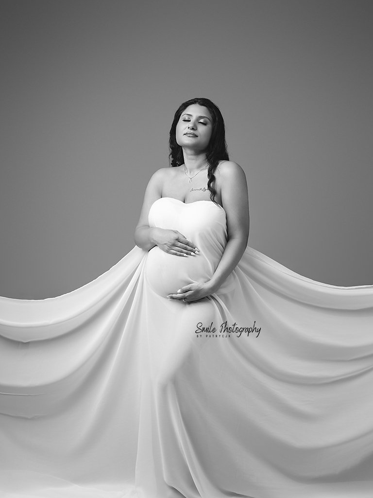 Elegant pregnancy photography session capturing a mother-to-be before her baby arrives
